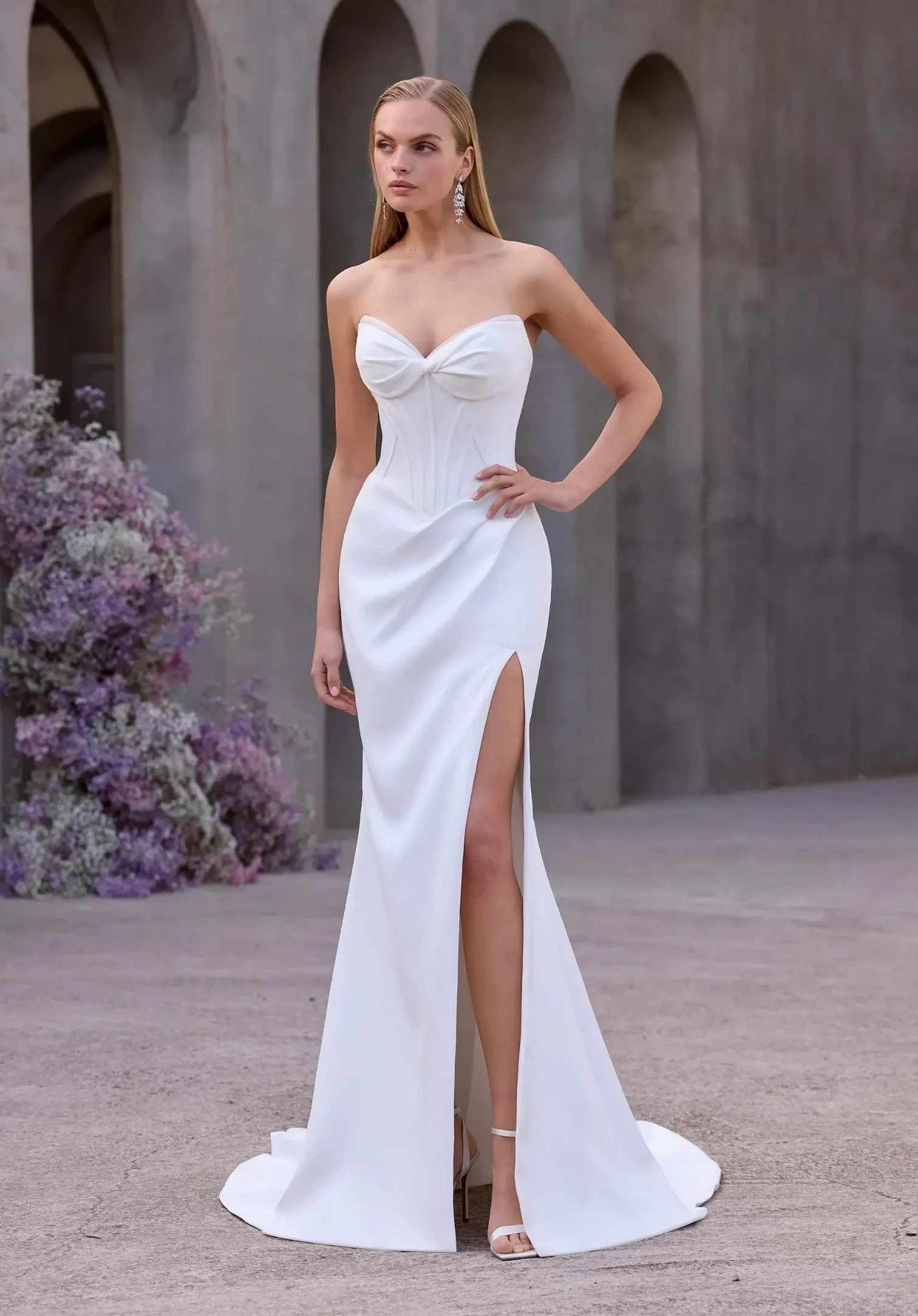 Model wearing a white J&B bridals gown