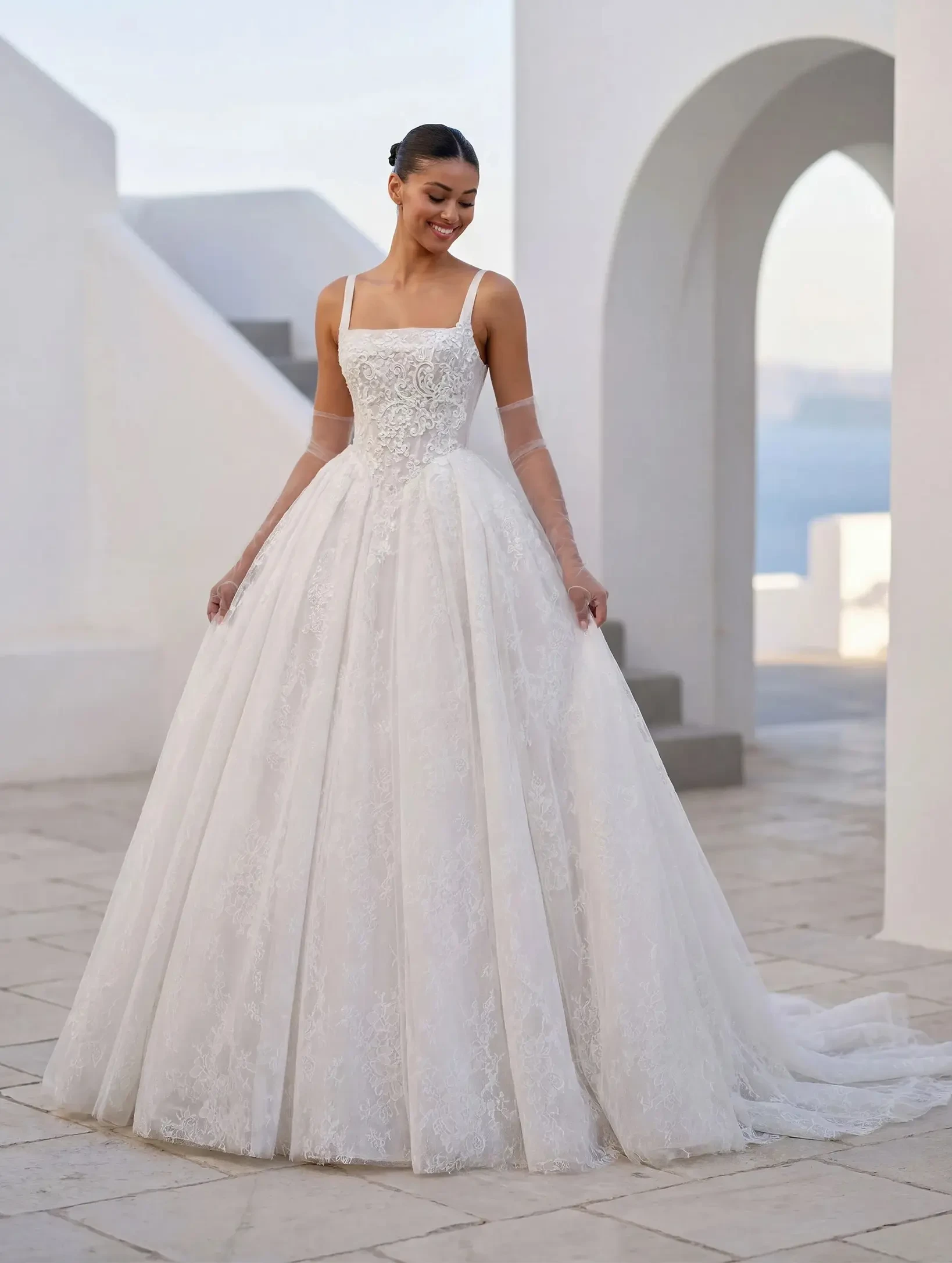 Model wearing a white J&B bridals gown