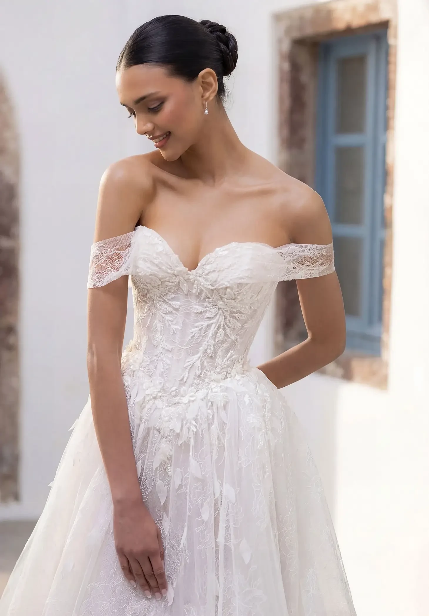 Model wearing a white J&B bridals gown