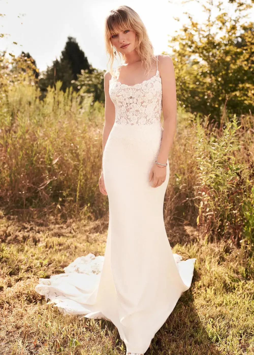 Model wearing a white J&B bridals gown
