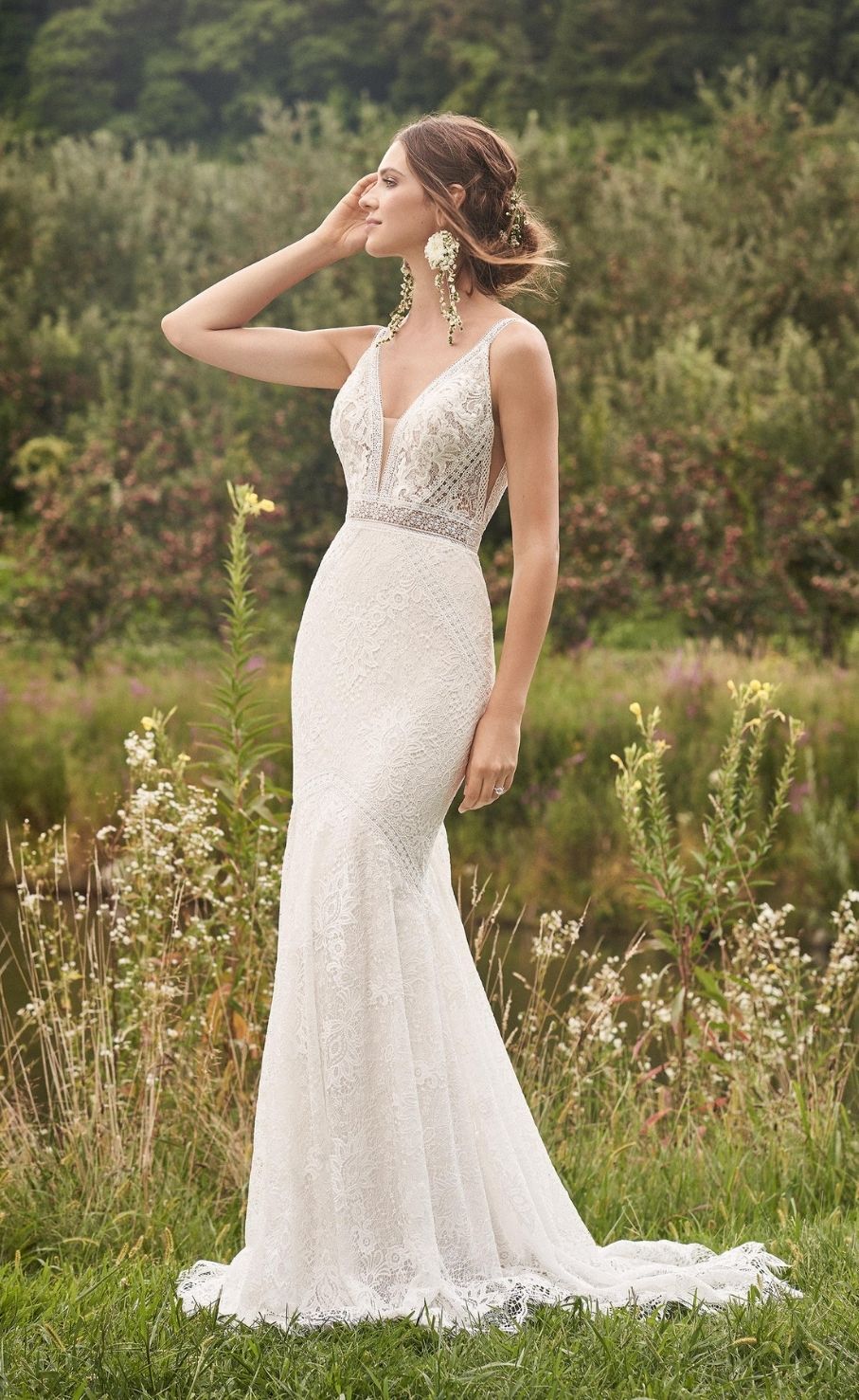 Model wearing a white J&B bridals gown