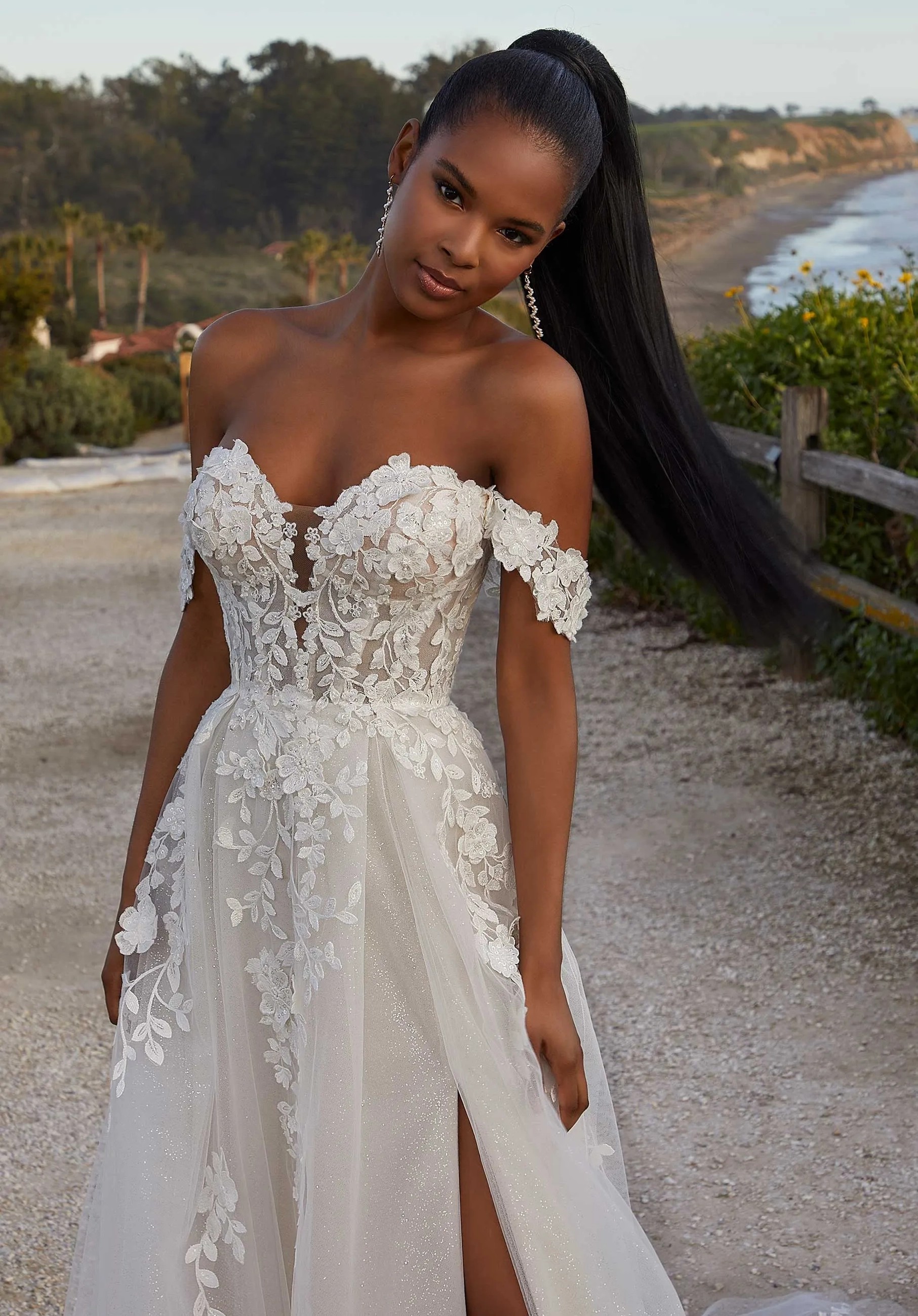 Model wearing a white J&B bridals gown