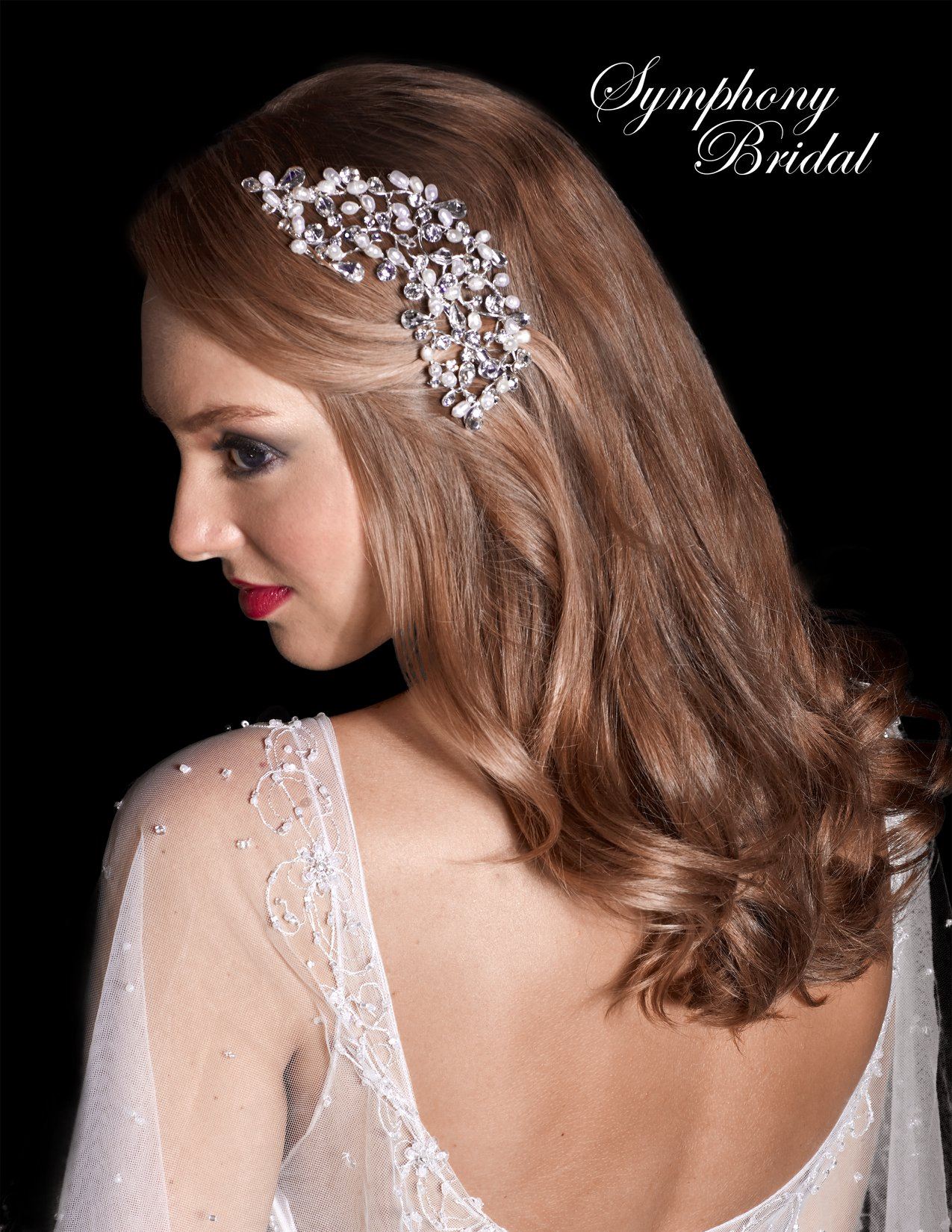 Model wearing hair clip and white wedding dress